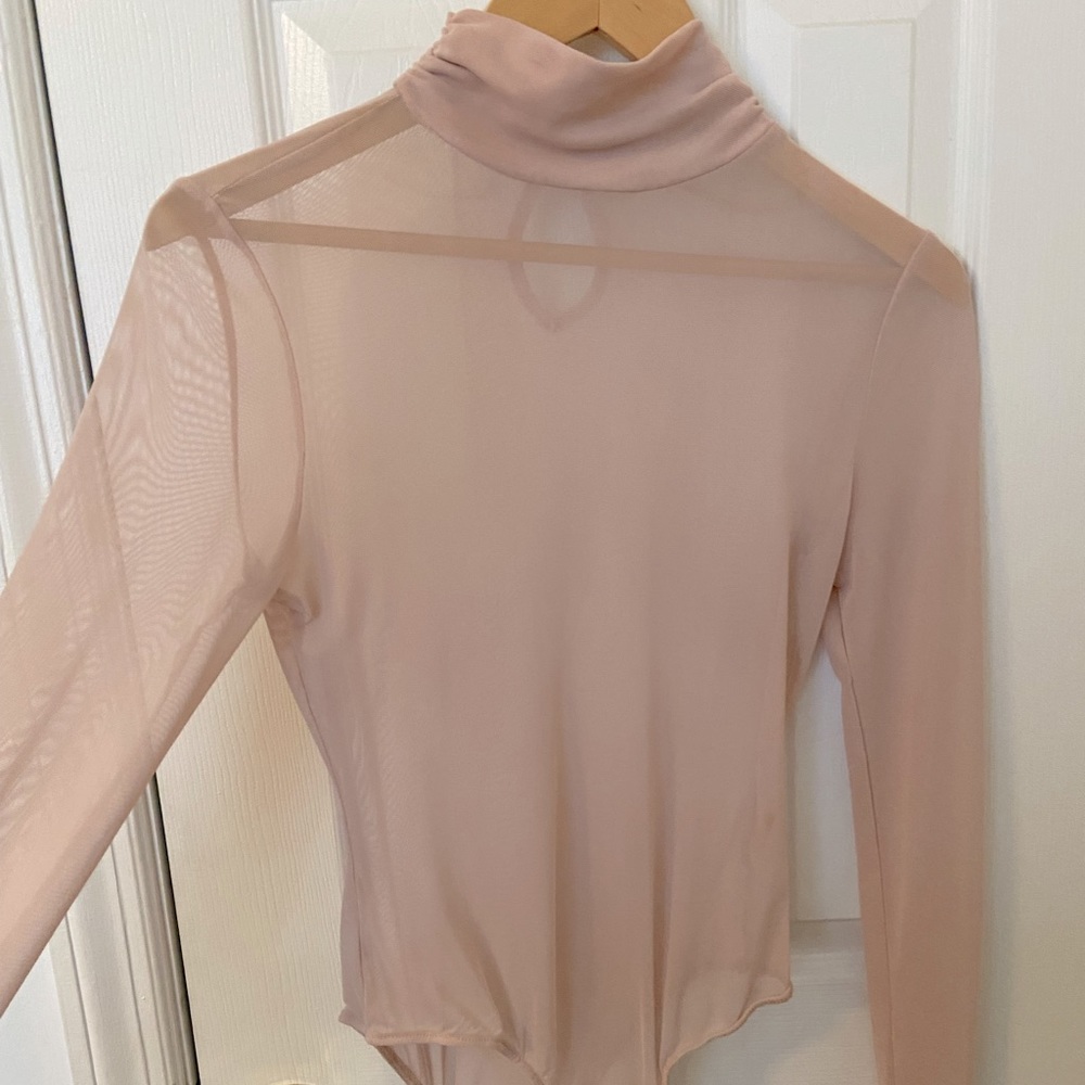 Pink see thru body suit never worn
